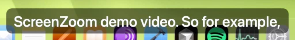 Burned-in subtitle bar over a macOS dock during a ScreenZoom demo